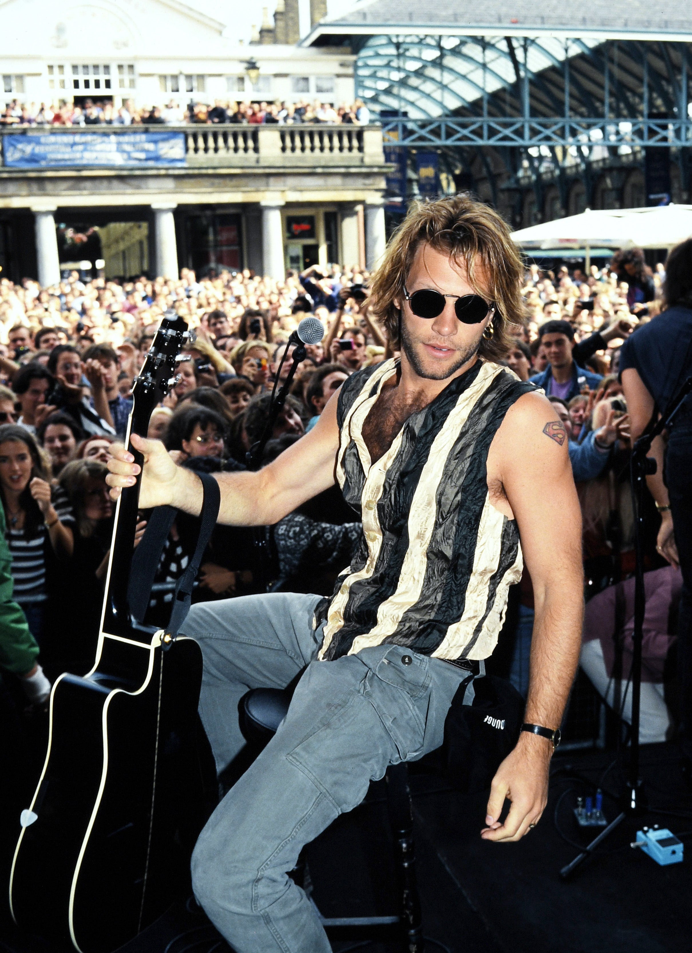 Jon Bon Jovi performs to a throng of fans in Covent Garden, London in 1994