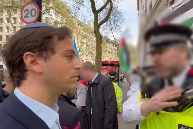 <p>Screengrab from video shared by Campaign Against Antisemitism of their chief executive Gideon Falter speaking to a Metropolitan Police officer during a pro-Palestine march in London (Campaign Against Antisemitism/PA)</p>