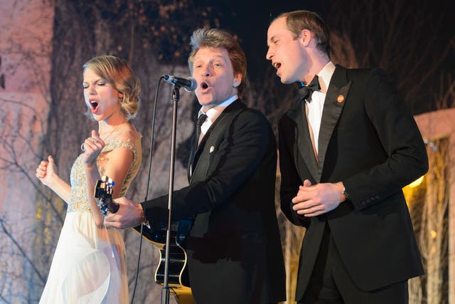 <p>Taylor Swift, Jon Bon Jovi and Prince William on stage at Kensington Palace in London in 2013</p>