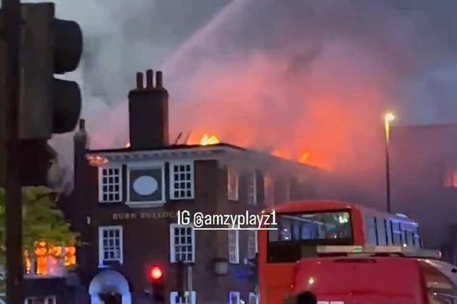 Picture taken with permission from the Instagram feed of @amzyplayz1 showing the historic Burn Bullock pub on fire in Mitcham (@amzyplayz1/PA)