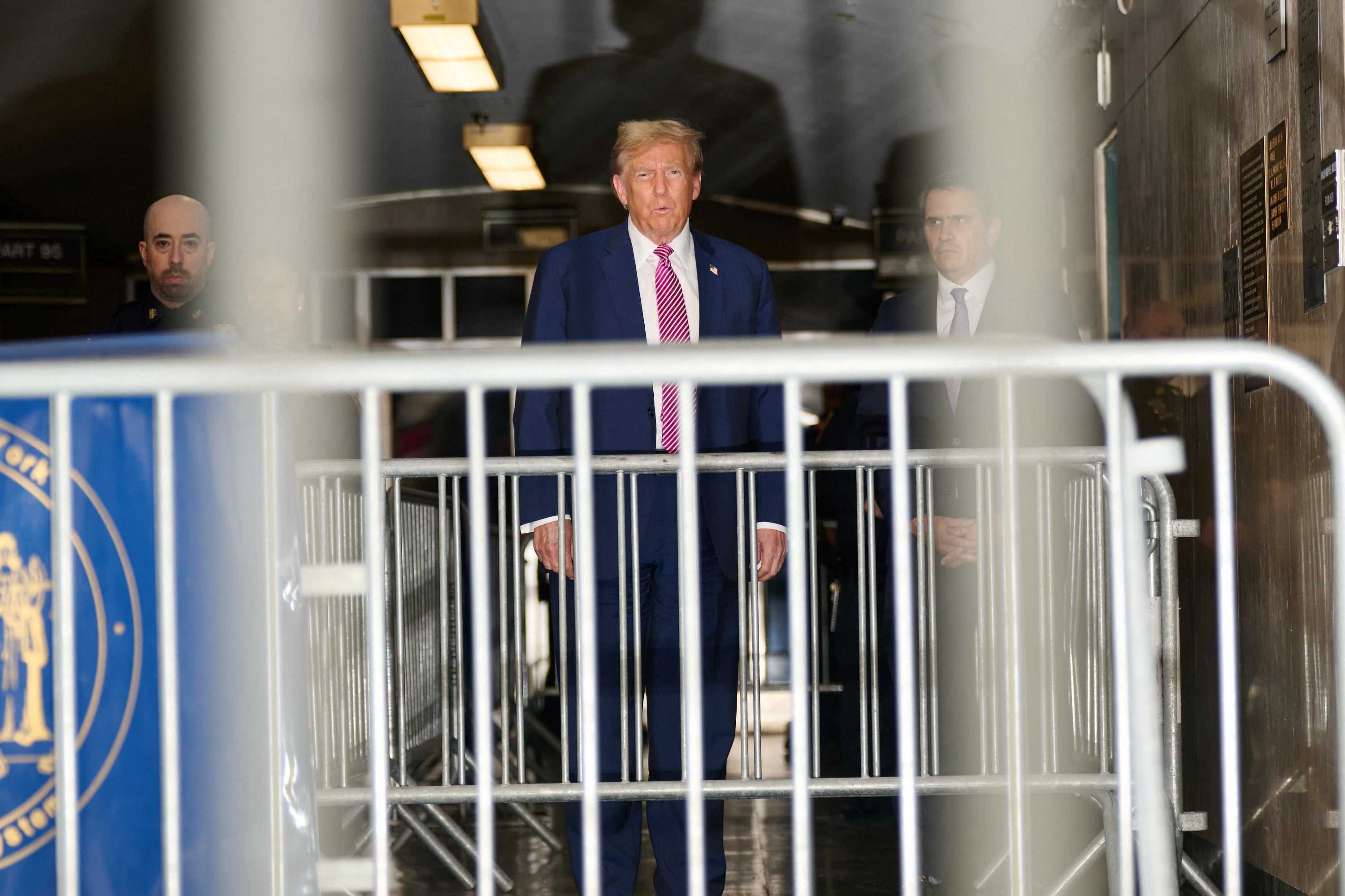 Former President Donald Trump and his defense team leaves Manhattan Supreme Court on the Day 4 of his Hush Money trial, in New York, U.S., April 19, 2024.