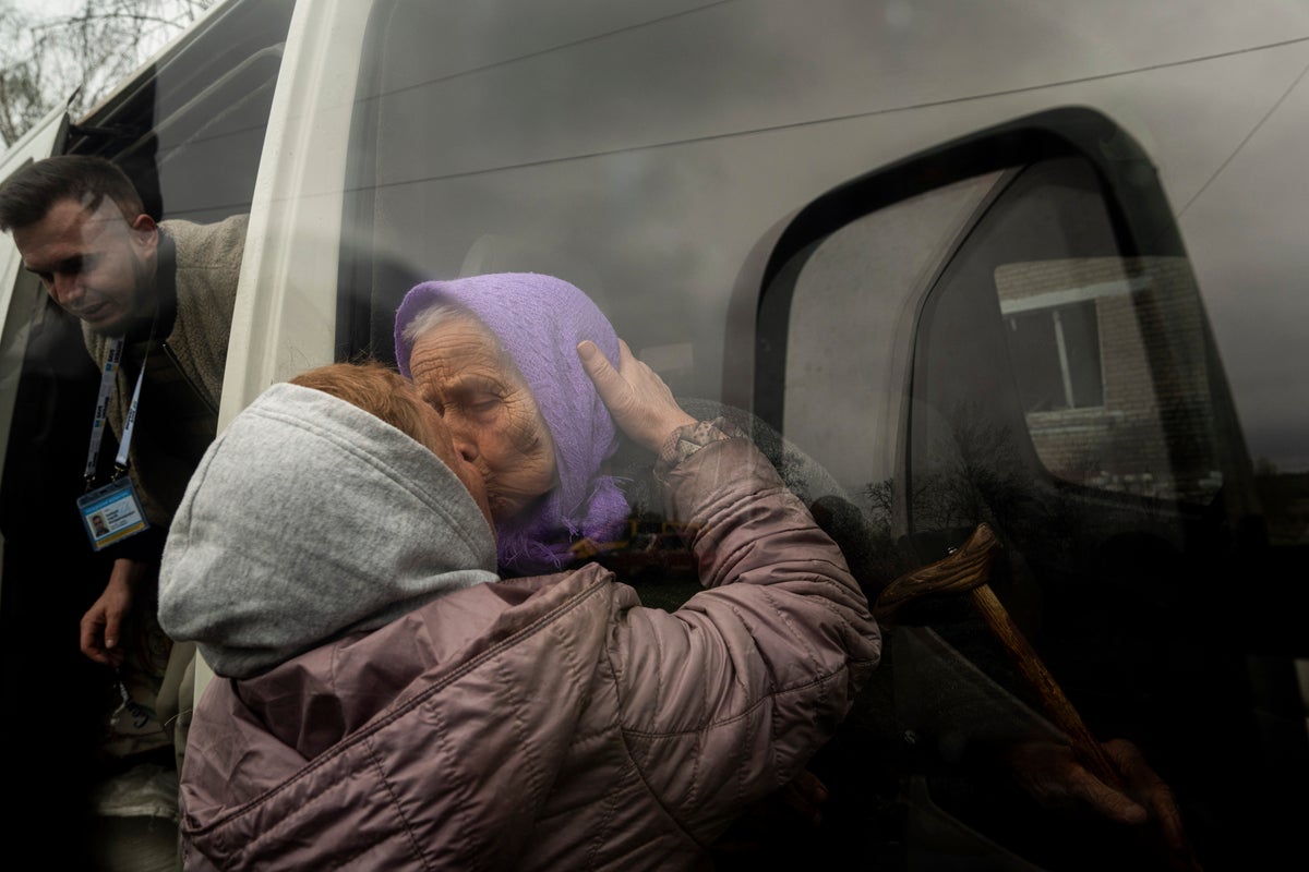 As Russia closes in on Kharkiv, some residents flee. Others will never leave