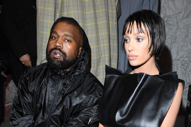 <p>Kanye West with Bianca Censori at the Marni Fall/Winter 2024 Fashion Show, Milan Fashion Week, in February 2024</p>