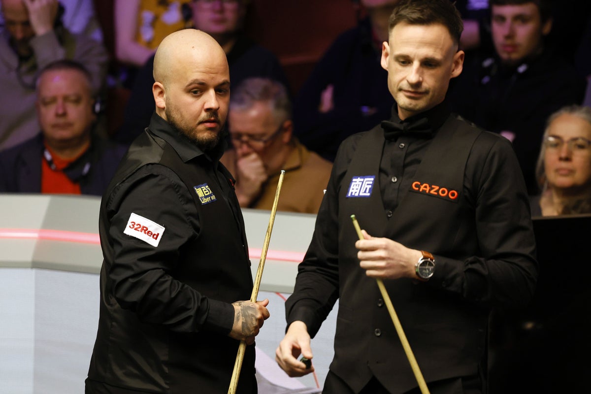 Luca Brecel defies illness to find form as World Championship title defence begins
