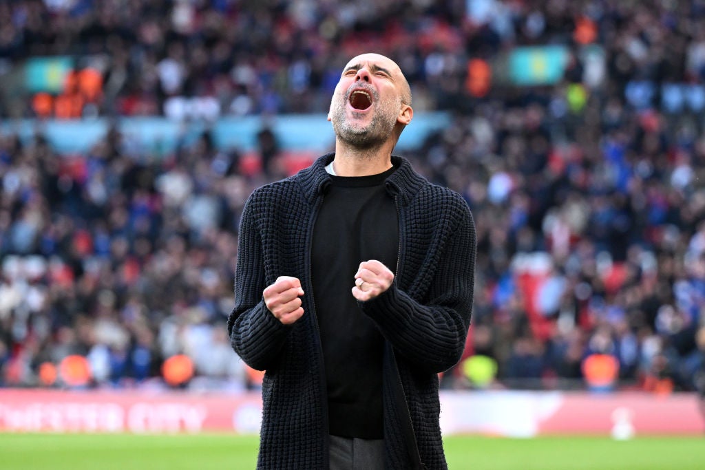 Pep Guardiola celebrates after City reached the FA Cup final