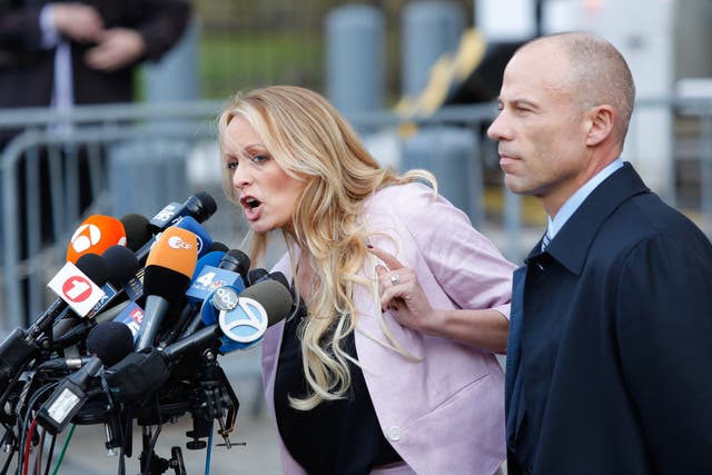 Adult film actor Stephanie Clifford, also known as Stormy Daniels, speaks outside US Federal Court with her lawyer Michael Avenatti in 2018
