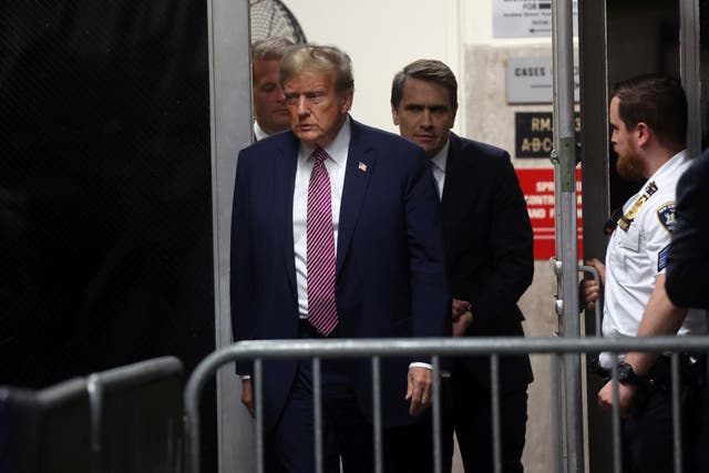 Former President Donald Trump, followed by attorney Todd Blanche, exits the courtroom following proceedings in his trial, Friday, April 19, 2024, at Manhattan Criminal Court in New York