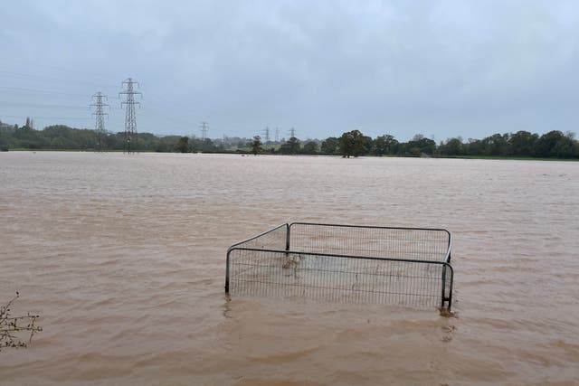 Flood water covers a field after the River Clyde overflowed in Clyst Saint Mary, near Exeter, in November (Ben Birchall/PA)