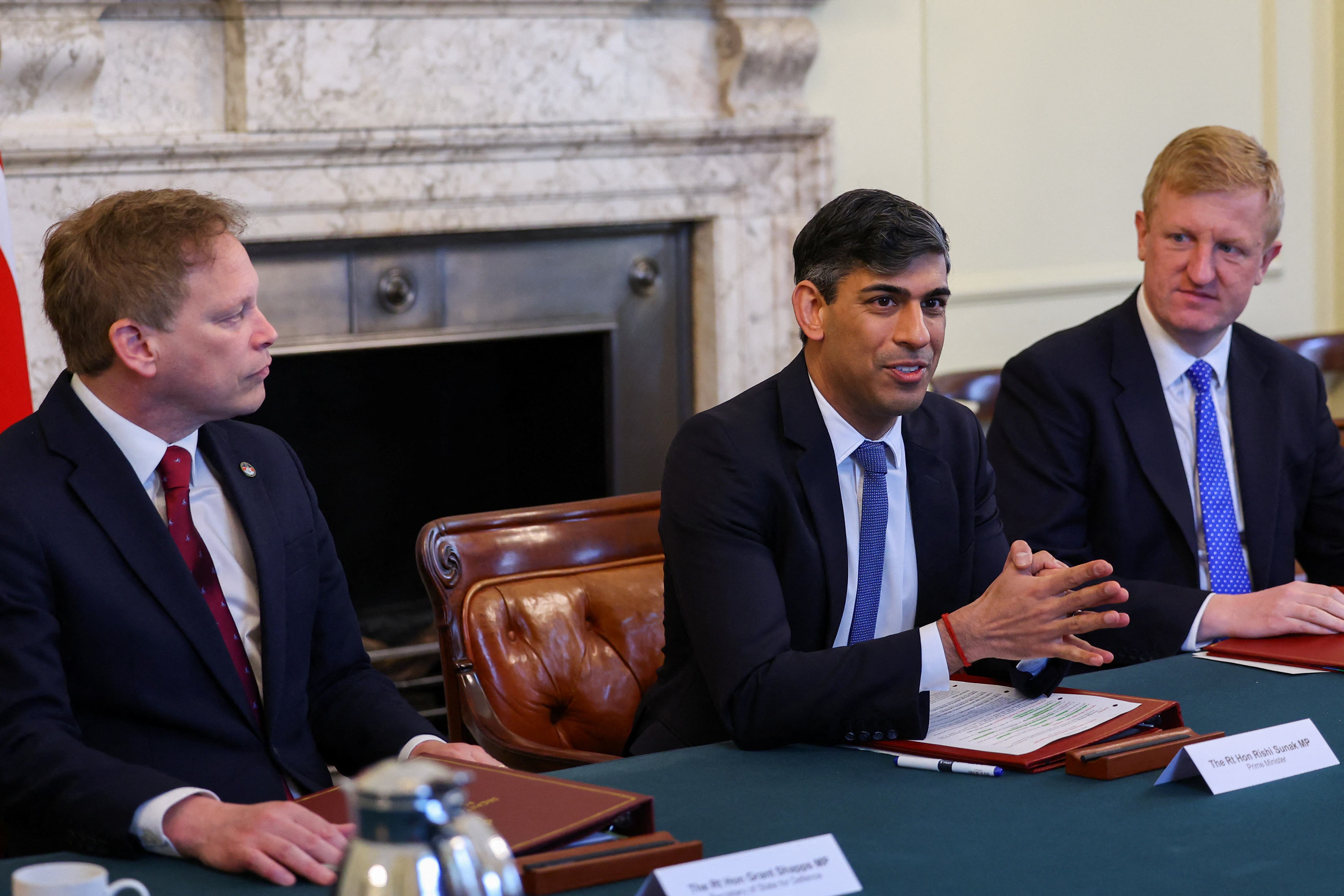 Prime Minister Rishi Sunak with Deputy Prime Minister Oliver Dowden (right) and Defence Secretary Grant Shapps (Toby Melville/PA)