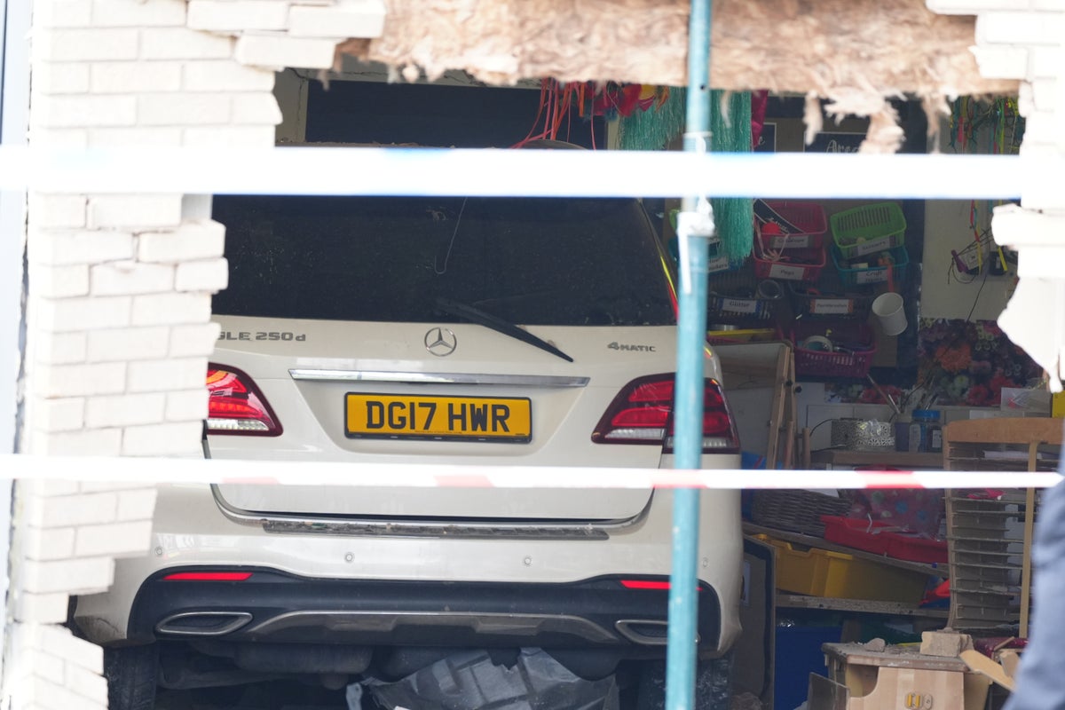 Mercedes crashes through wall of primary school in Liverpool as dramatic pictures show car in classroom