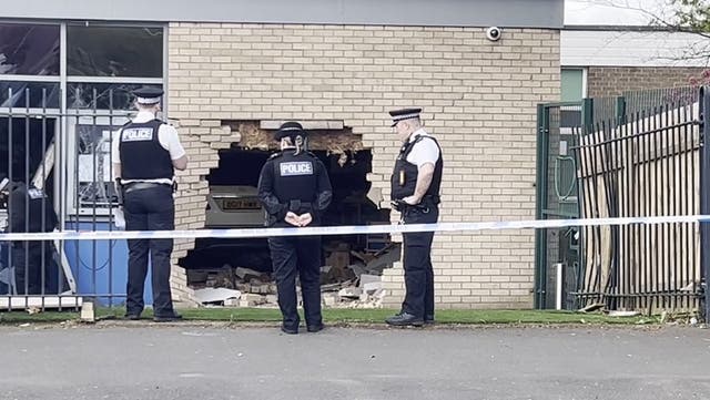 <p>Emergency services at scene after car crashes through primary school classroom in Liverpool.</p>