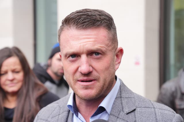 <p>Tommy Robinson, real name Stephen Yaxley Lennon, outside Westminster Magistrates’ Court (Jonathan Brady/PA)</p>
