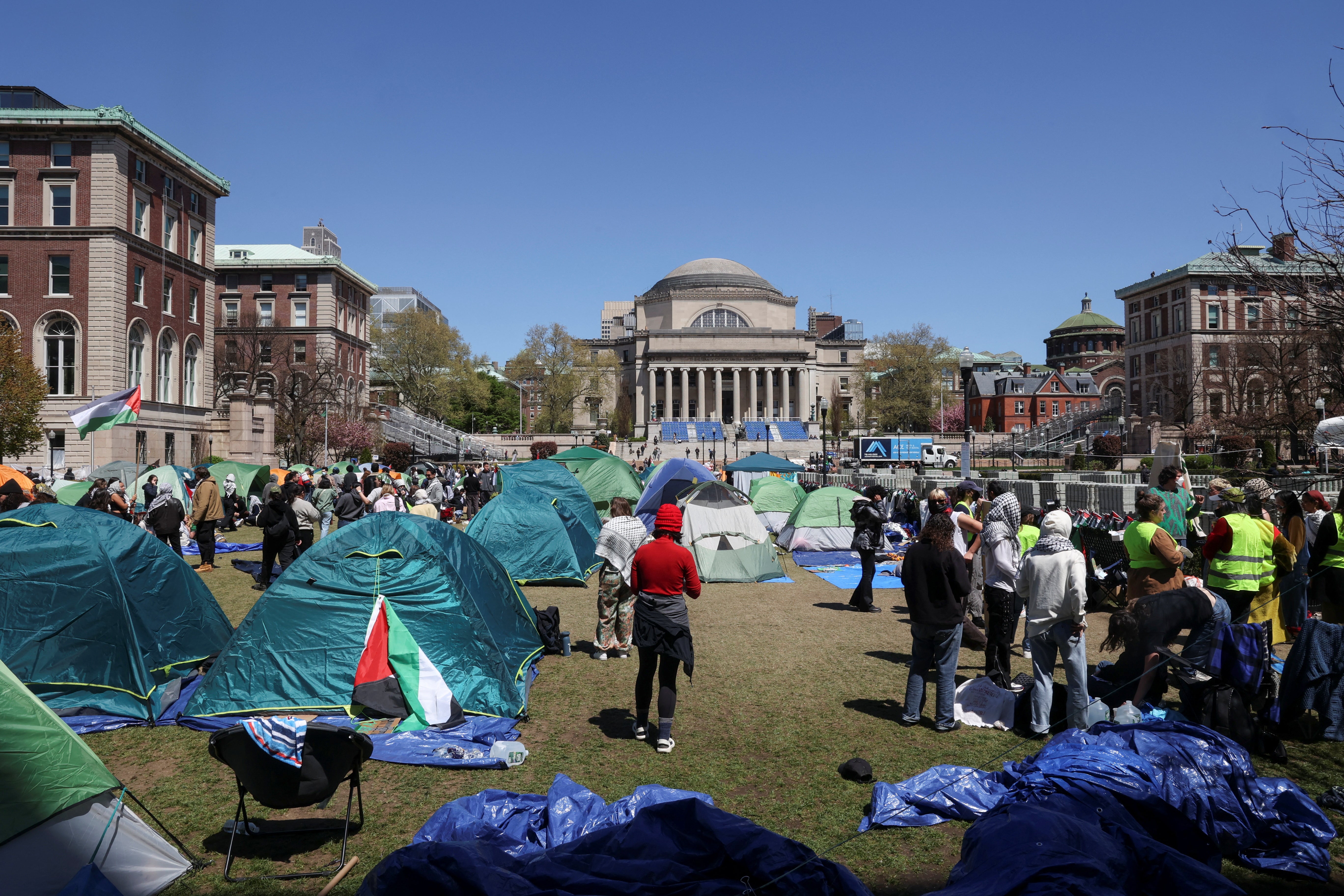 Students protest in support of Palestinians on Columbia University campus, as protests continue inside and outside the university, amid the ongoing conflict between Israel and the Palestinian Islamist group Hamas, in New York City on 22 April 2024