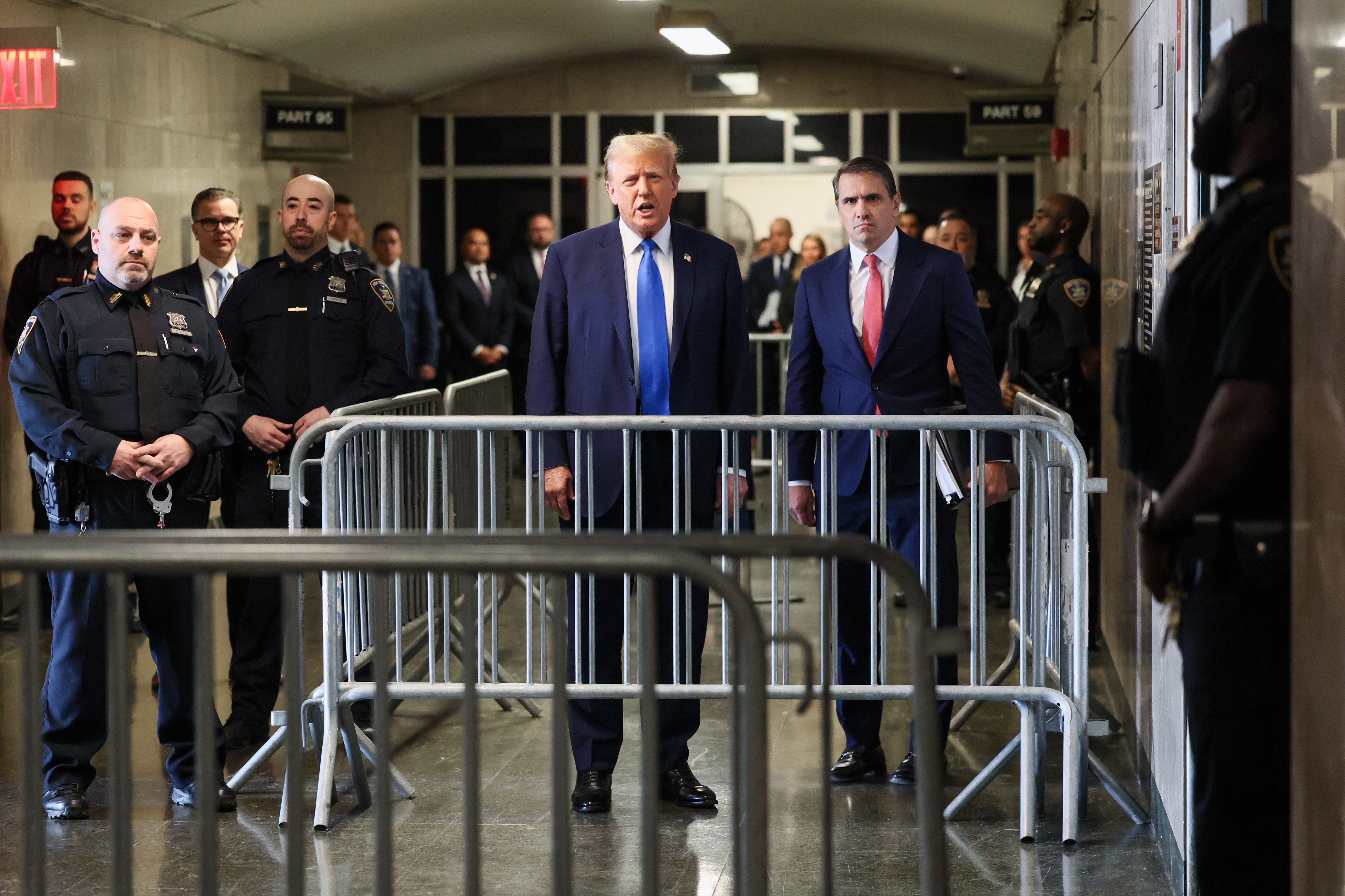 Donald Trump speaks to the media ahead of Monday’s opening statements in court for the hush money trial in New York City