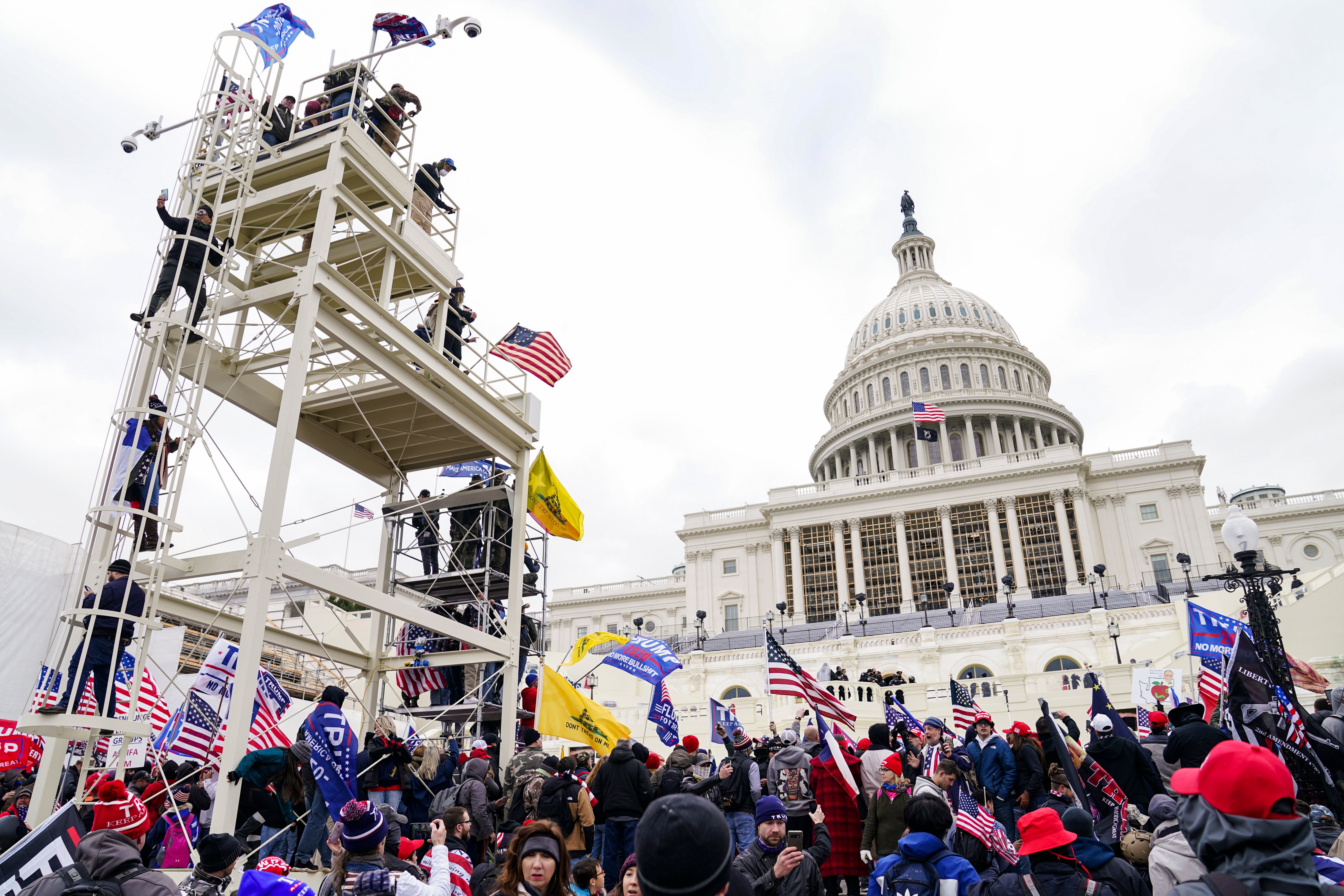 Violent insurrectionists loyal to President Donald Trump breach the U.S. Capitol in Washington, Jan. 6, 2021