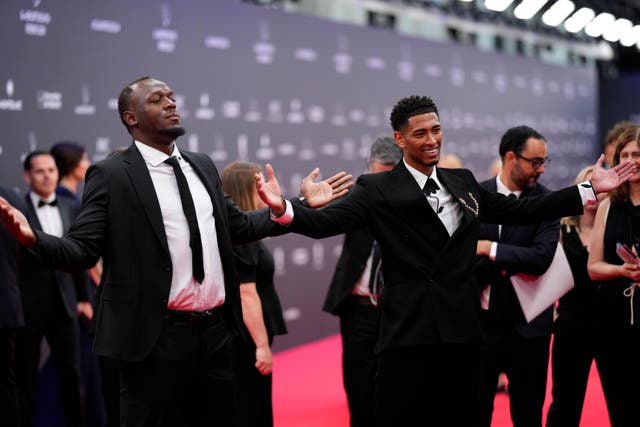 Former Jamaican athlete Usain Bolt (left) and Real Madrid’s Jude Bellingham (right) pose at the red carpet before the Laureus World Sports Awards in Madrid (Manu Fernandez/AP)