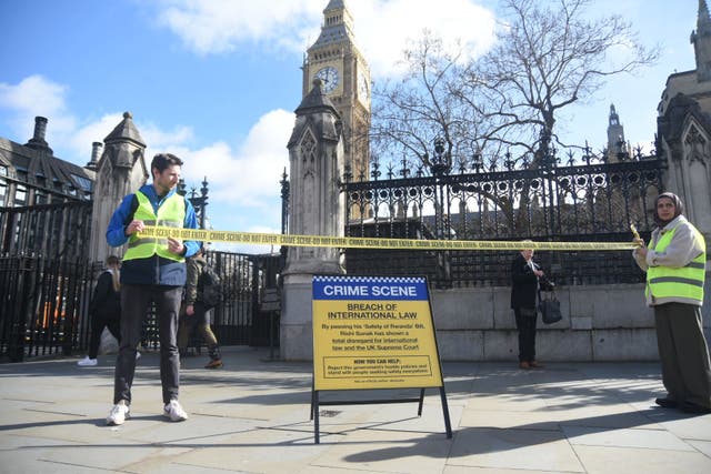 The groups previously displayed their message outside Parliament (Freedom from Torture/PA)