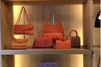 Photo is of handbags designed by Nancy Gonzalez and displayed in the Gzuniga Ltd. showroom