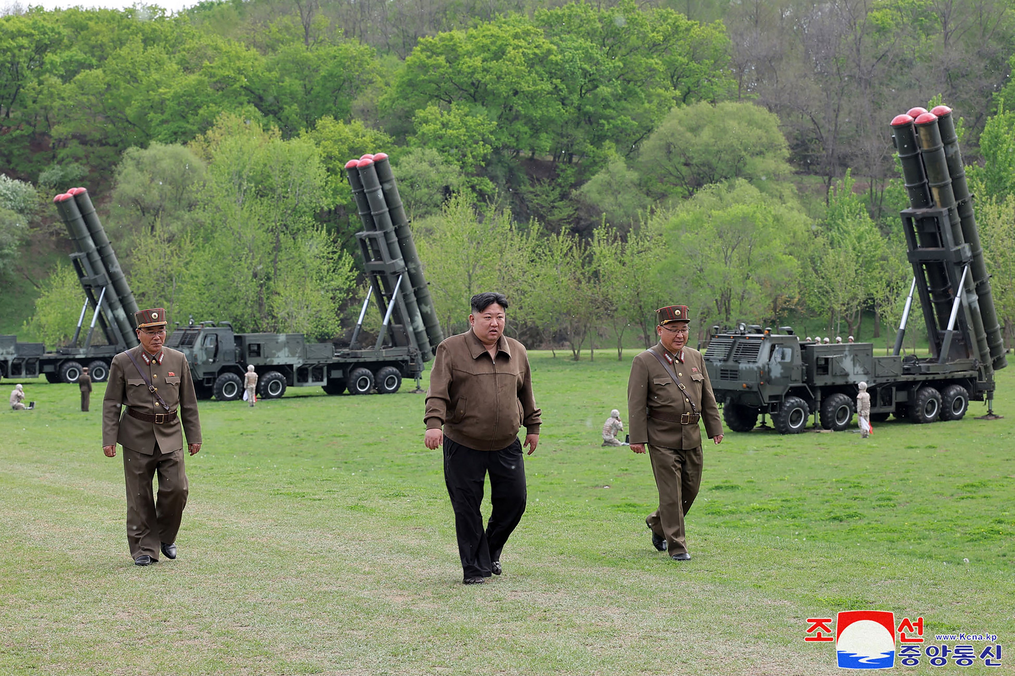 Kim Jong-un oversees a virtual nuclear counterattack training exercise with a large rocket artillery unit