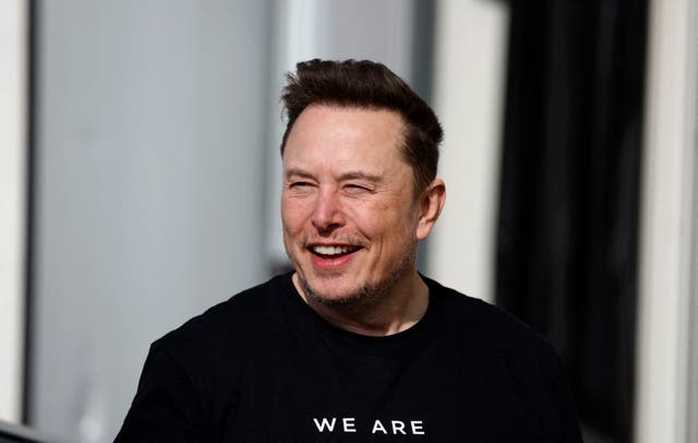<p>Tesla CEO Elon Musk is pictured during a visit at company’s electric car plant in Gruenheide near Berlin on 13 March 2024, as employees resumed work after production had to be halted due to a suspected arson attack that caused a power outage</p>