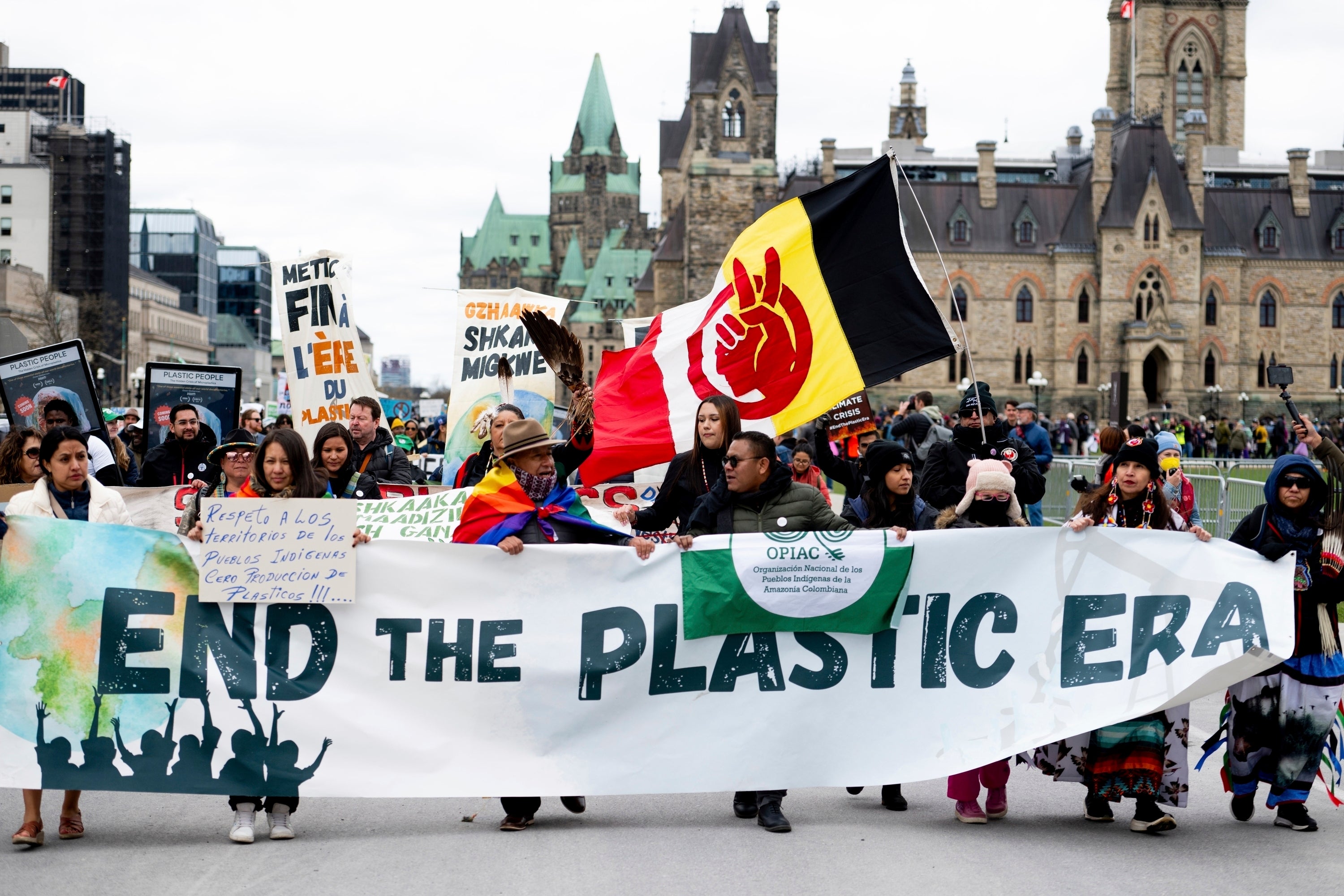 People participate in a March to End the Plastic Era on Parliament Hill in Ottawa, Ontario