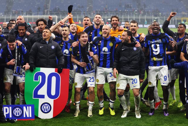 <p>Inter celebrate winning a 20th Serie A title after beating rivals Milan </p>