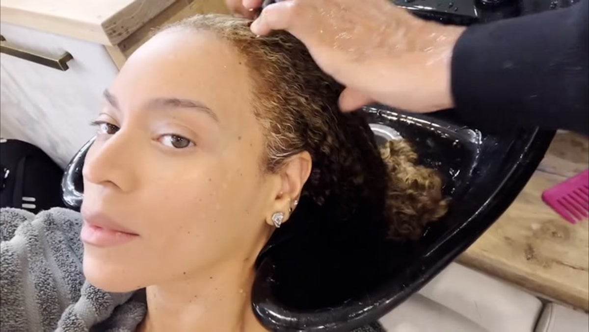 Beyoncé shares rare glimpse of natural hair in behind-the-scenes transformation