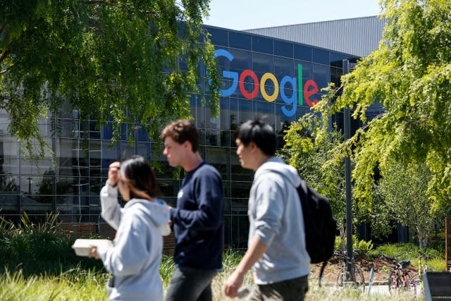 <p>People walk on Google’s main campus.  Some employees took part in sit-ins last week over Google’s $1.2bn contract with Israel </p>