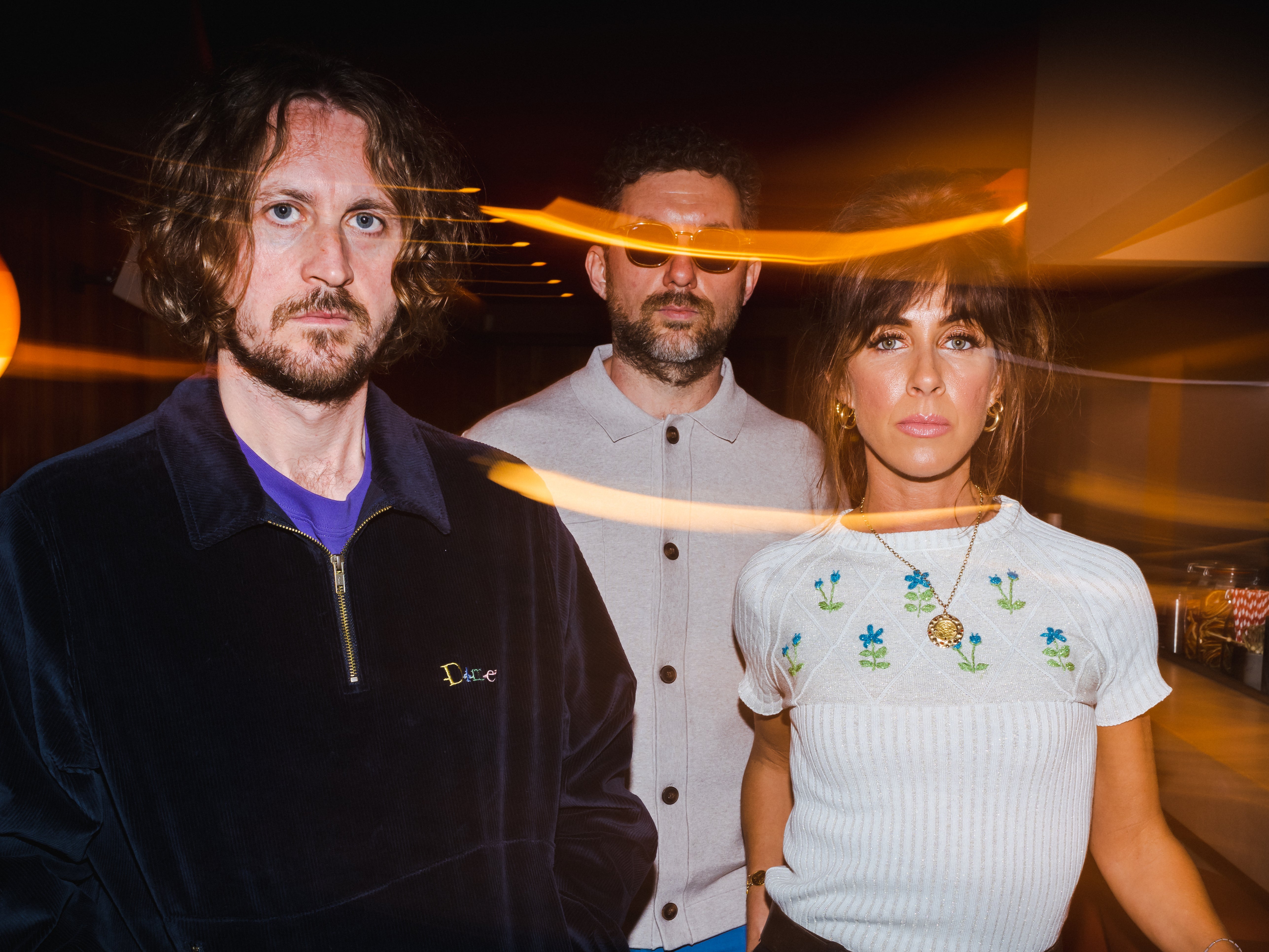 Dave McCabe, Sean Payne and Abi Harding of The Zutons