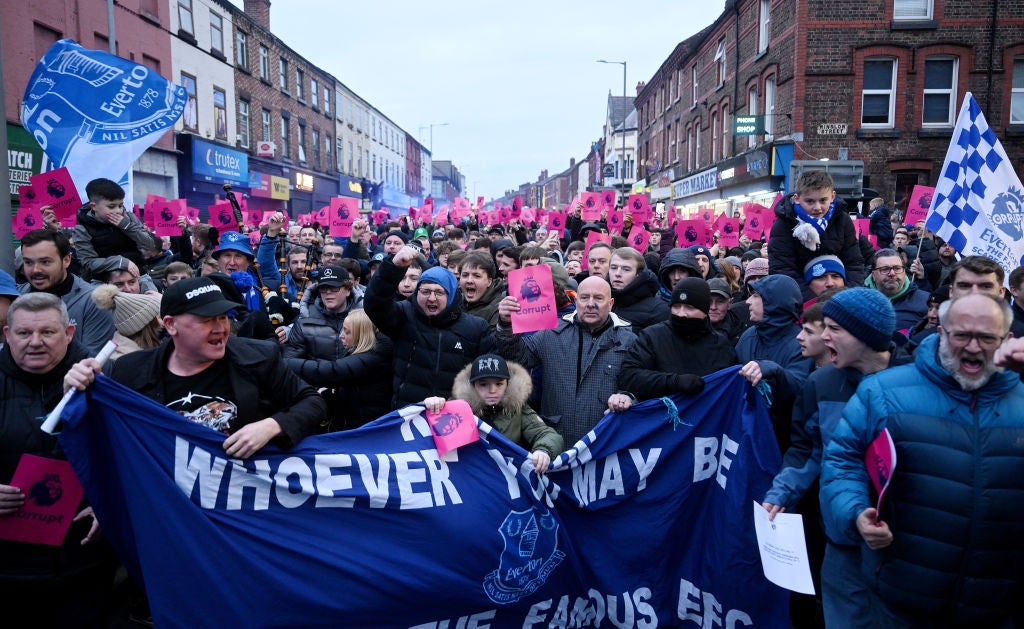 Everton fans protesting after receiving a points deduction from the Premier League