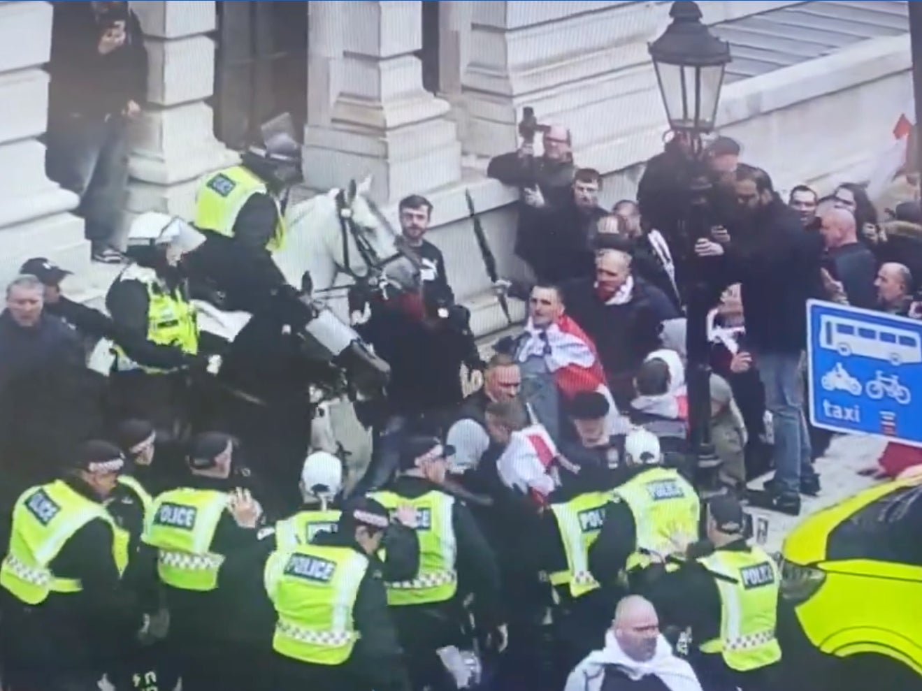 One police horse was hit by what appeared to be an umbrella