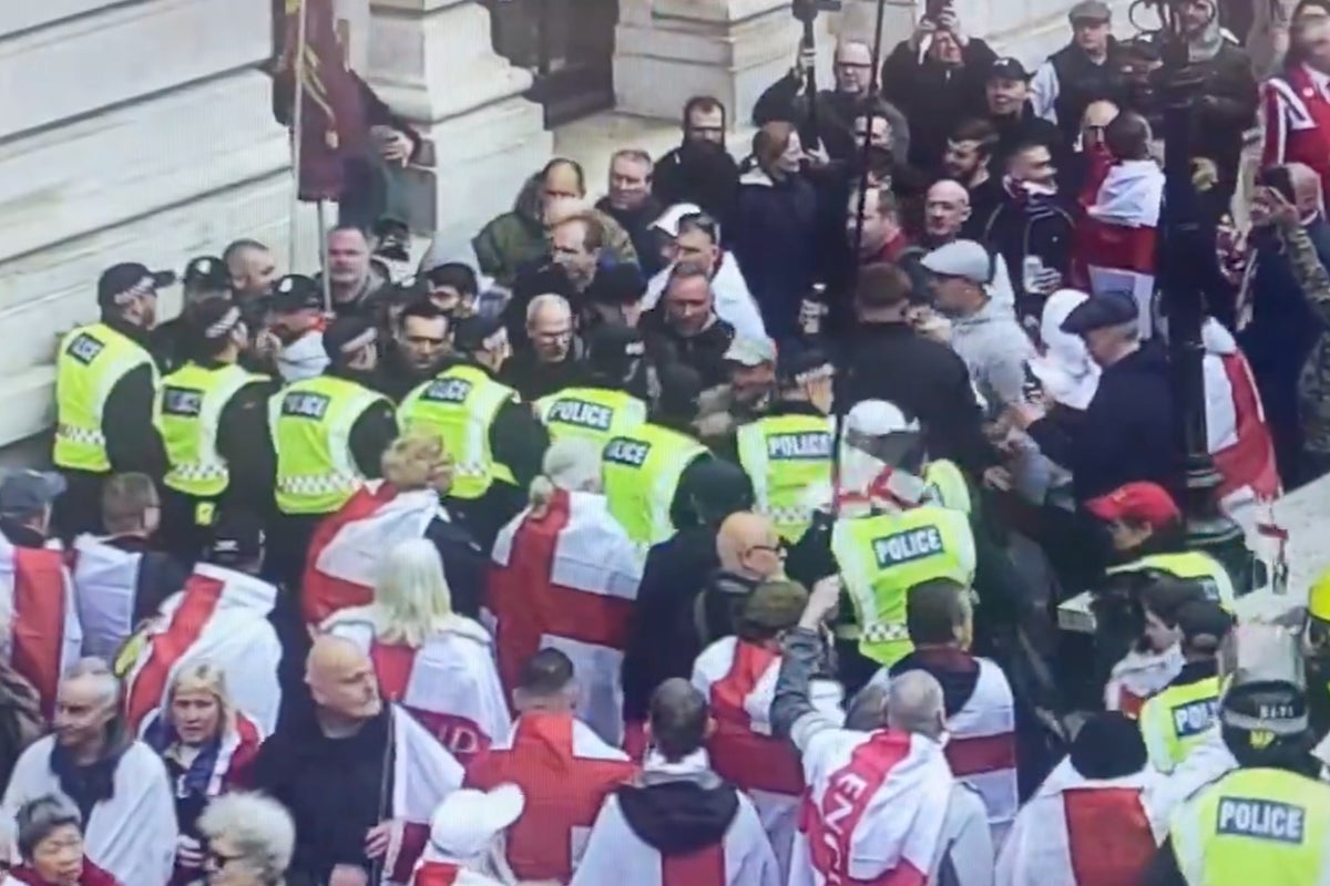 St George’s Day rally in London turns violent as police clash with men wearing England flags