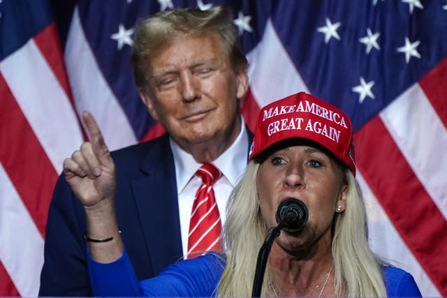 <p>Marjorie Taylor Greene speaks alongside Donald Trump at a campaign event in Rome, Georgia, on 9 March 2024</p>