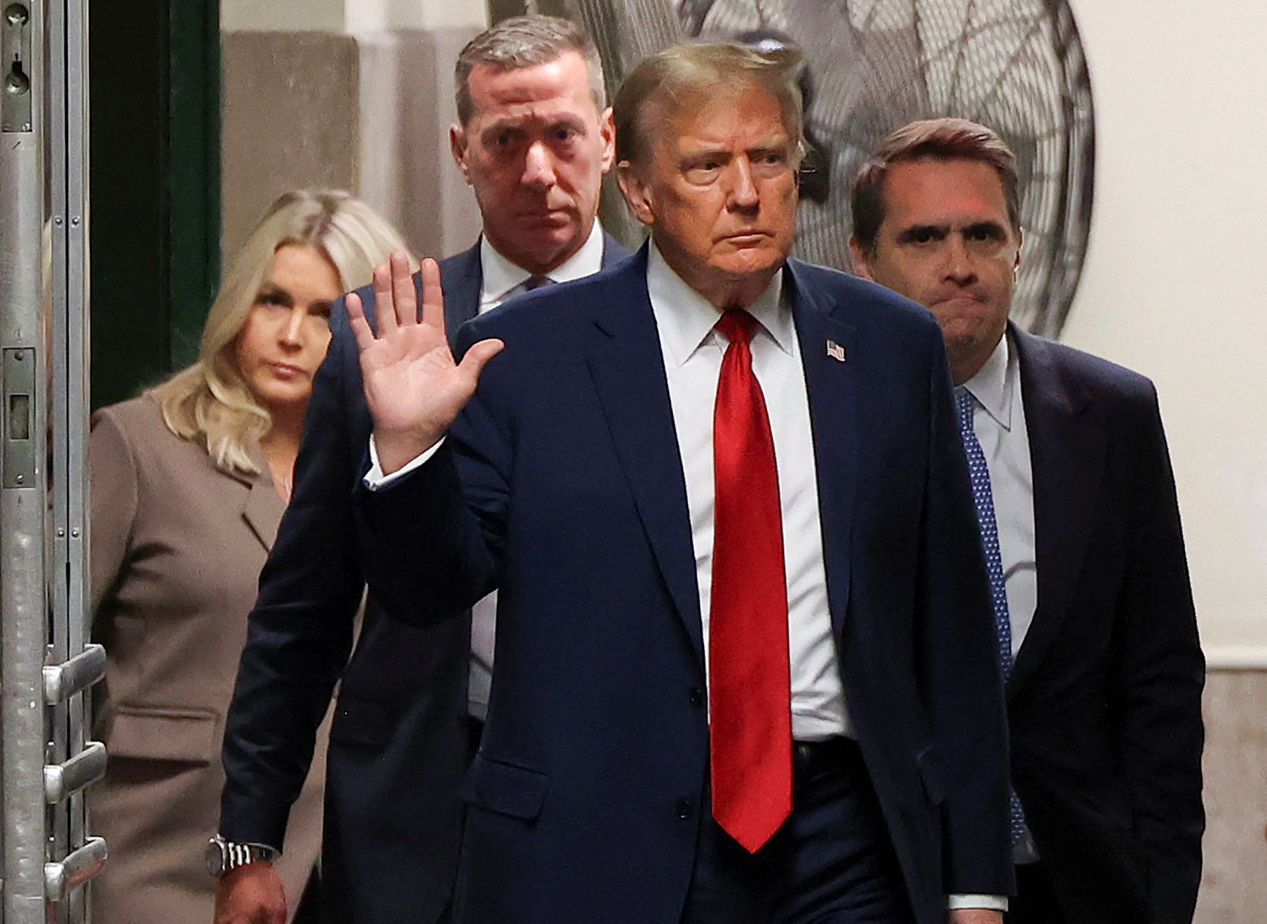 Former US President Donald Trump returns to the courtroom after a recess in Manhattan criminal court, Tuesday, April 2