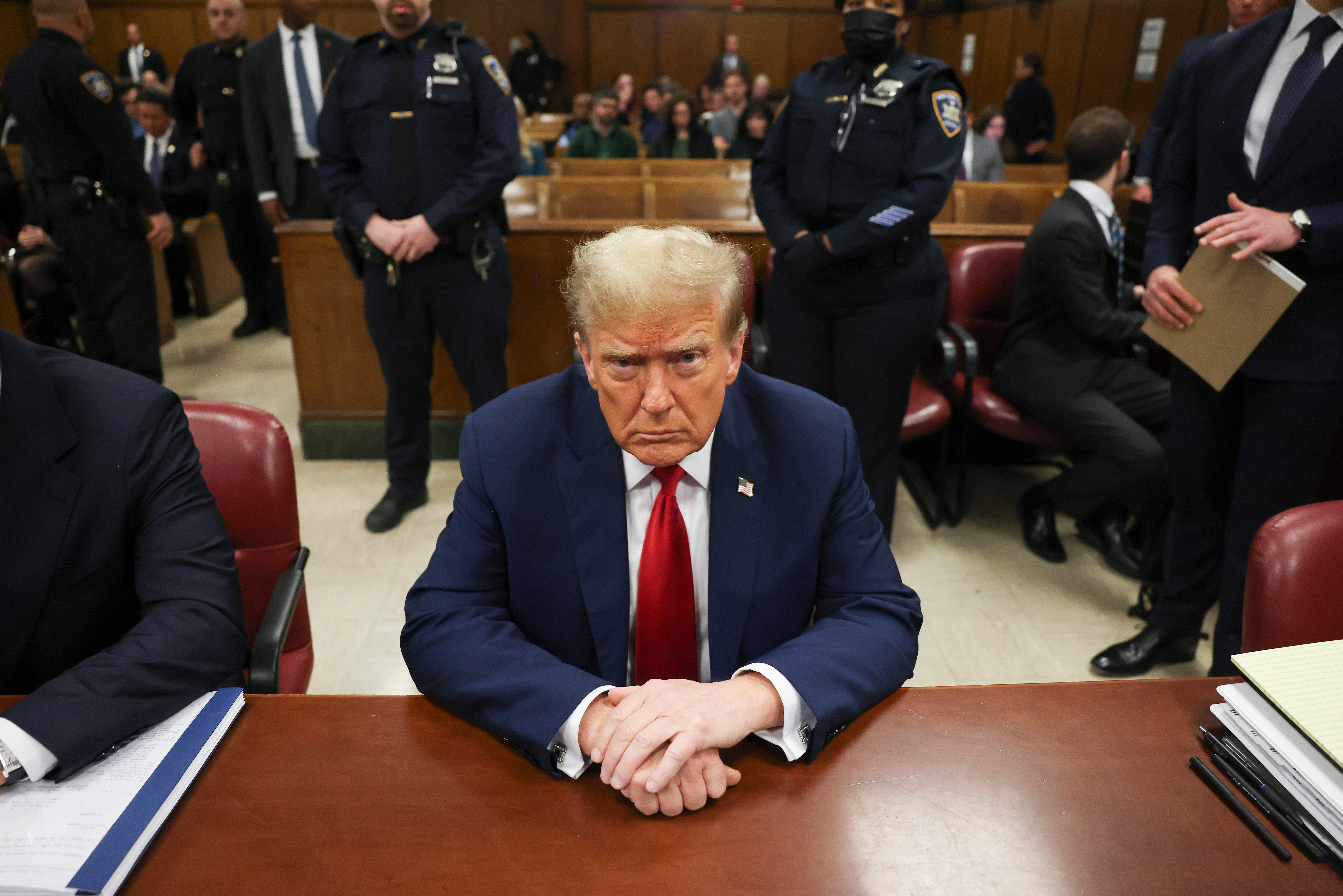 Donald Trump sits at the defence table in a Manhattan criminal courtroom on 23 April.