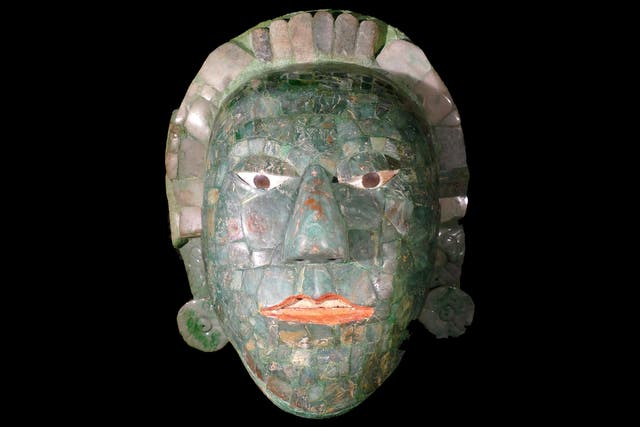 <p>Maya royalty: probable conquerors burned the kingdom’s sacred regalia, including a jade death mask much like this one </p>