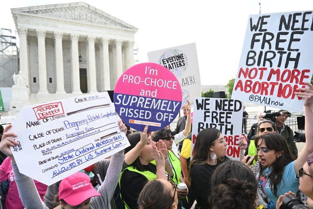 <p>Reproductive rights activists outside of the Supreme Court at justices debate a near-total ban on abortion in Idaho</p>