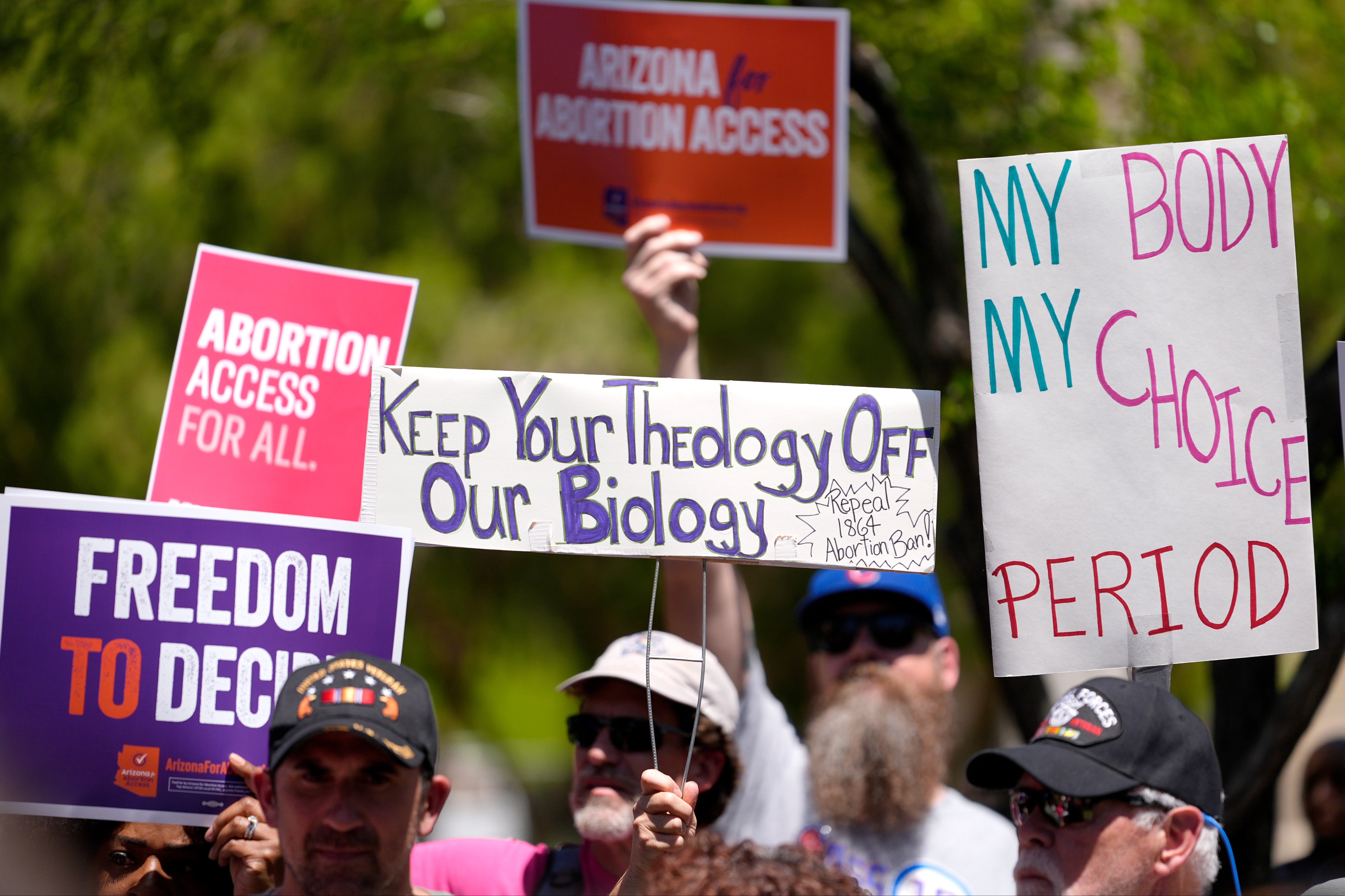 Abortion rights supporters gather outside the Capitol, Wednesday, April 17, 2024, in Phoenix. Arizona