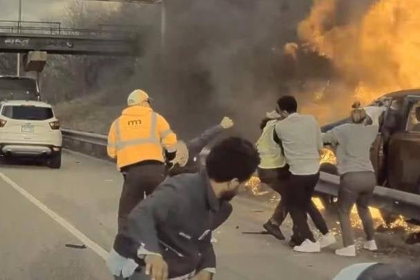 <p>Sam Obrovich, 71, was saved from a burning vehicle after his car crashed into a lamppost in St Paul, Minnesota</p>