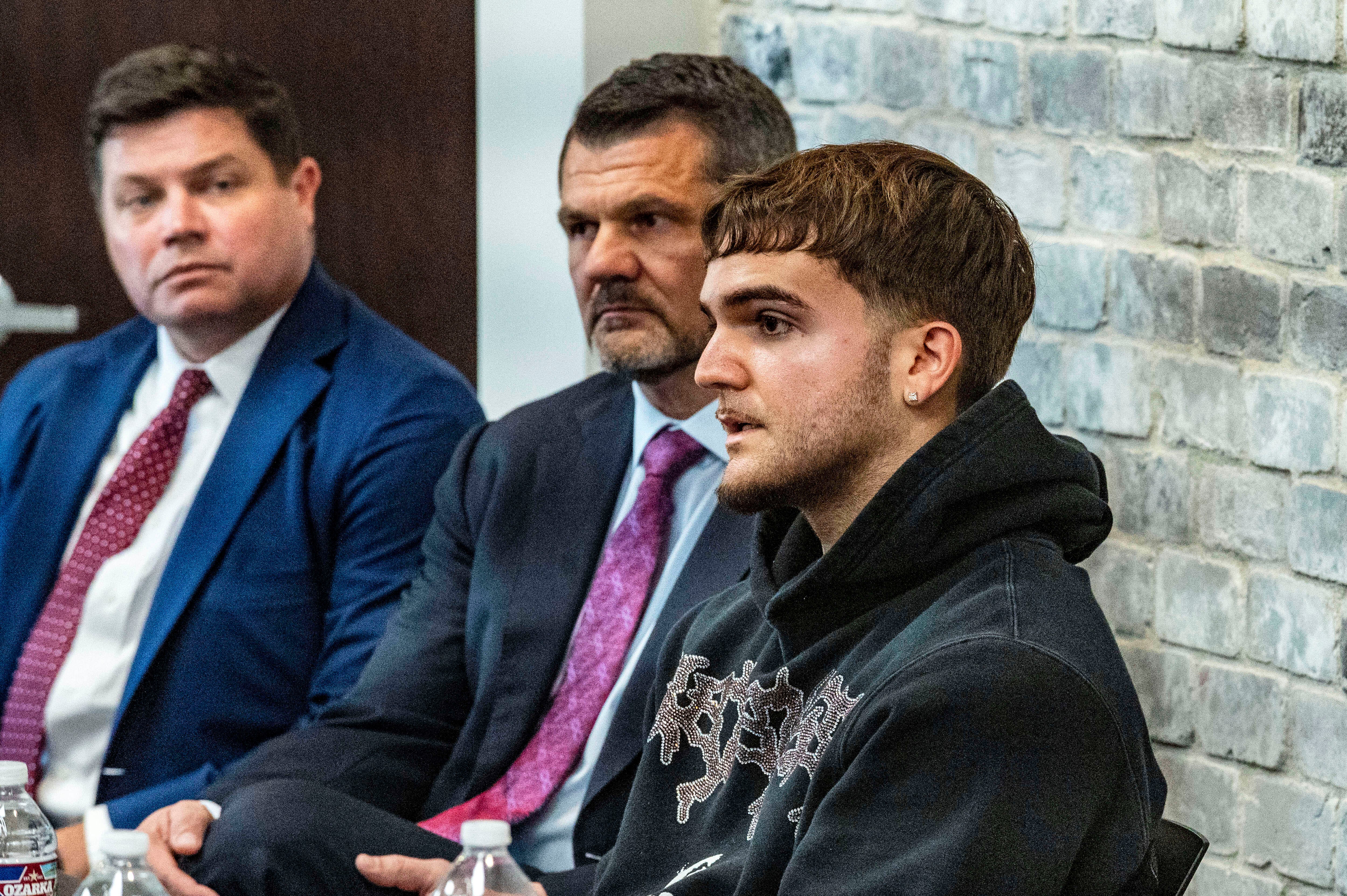 Daniel Rodriguez-Corrales, right, describes the days immediately before his father's death