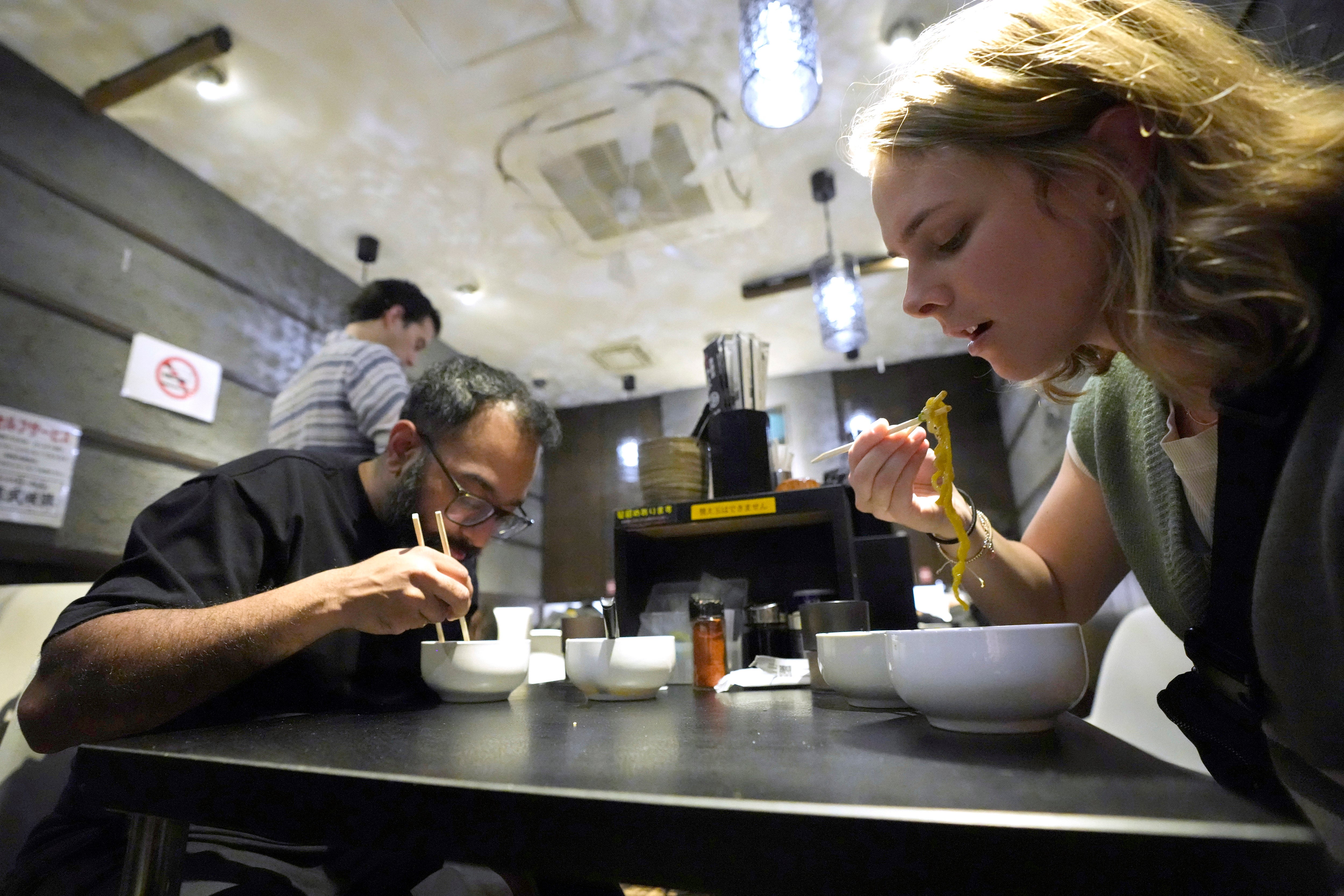 Participants eat the noodle at Shinbusakiya, a ramen shop which offers ‘Hokkaido classics’