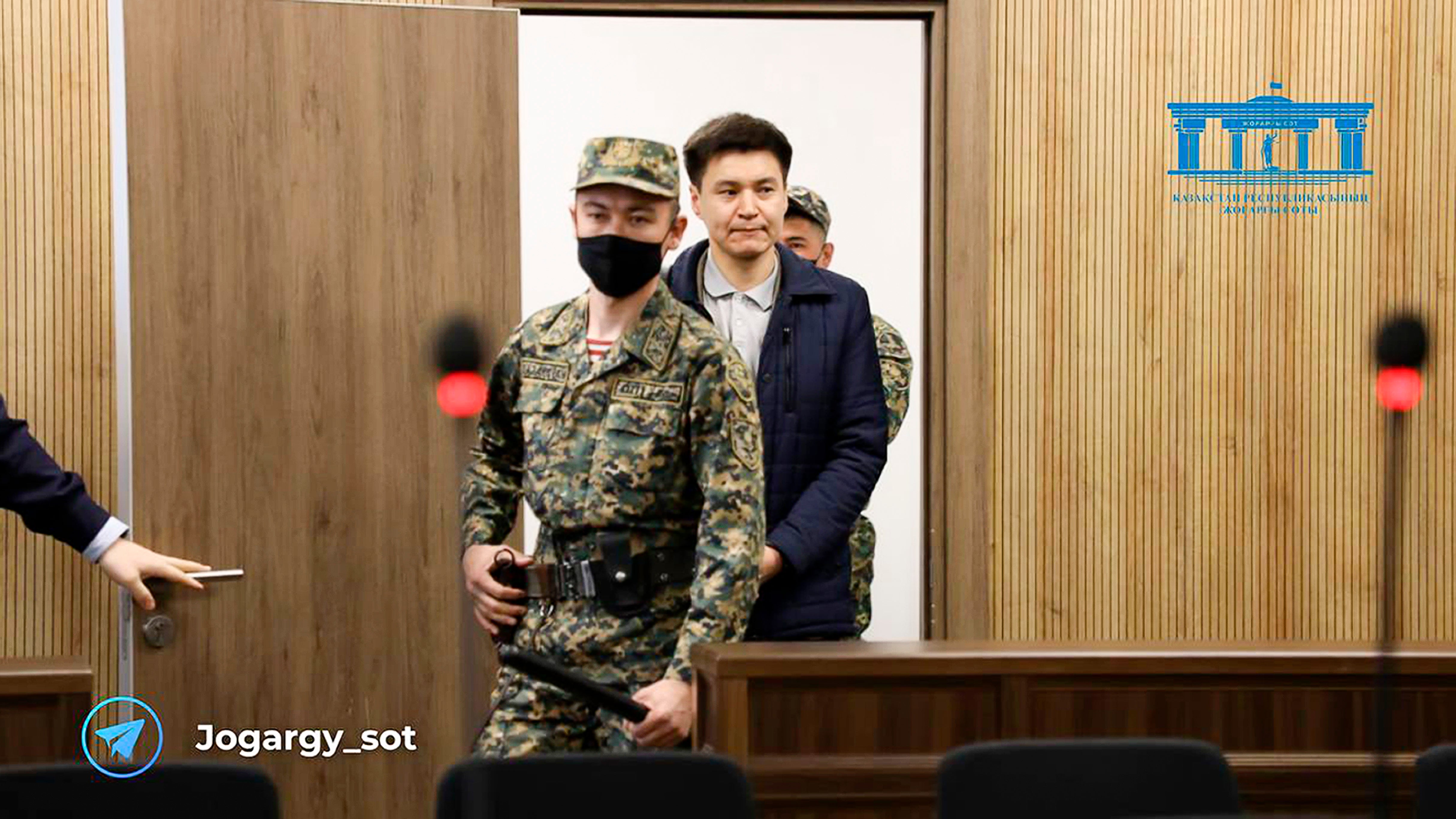 Kazakhstan In this photo released by The Kazakhstan Supreme Court Press Office’s Telegram channel on Friday, April 19, 2024, businessman Kuandyk Bishimbayev, the country’s former economy minister, is escorted into court in Astana, Kazakhstan
