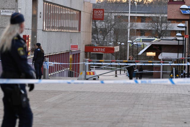 <p>File: Swedish police on the scene after a person was shot dead in southern Stockholm</p>