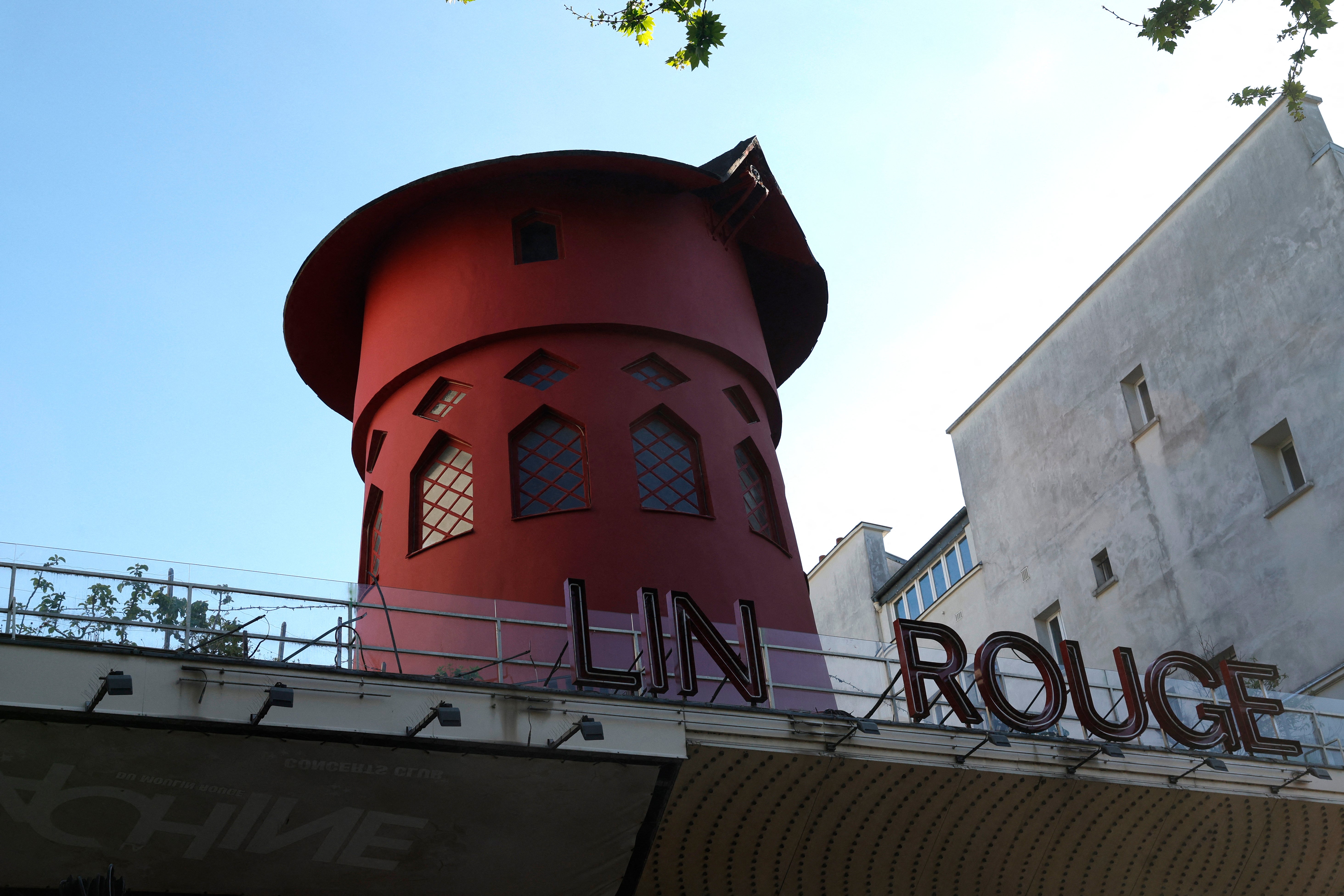 <p>This image shows the Moulin Rouge cabaret mill without the blades and part of the missing sign</p>