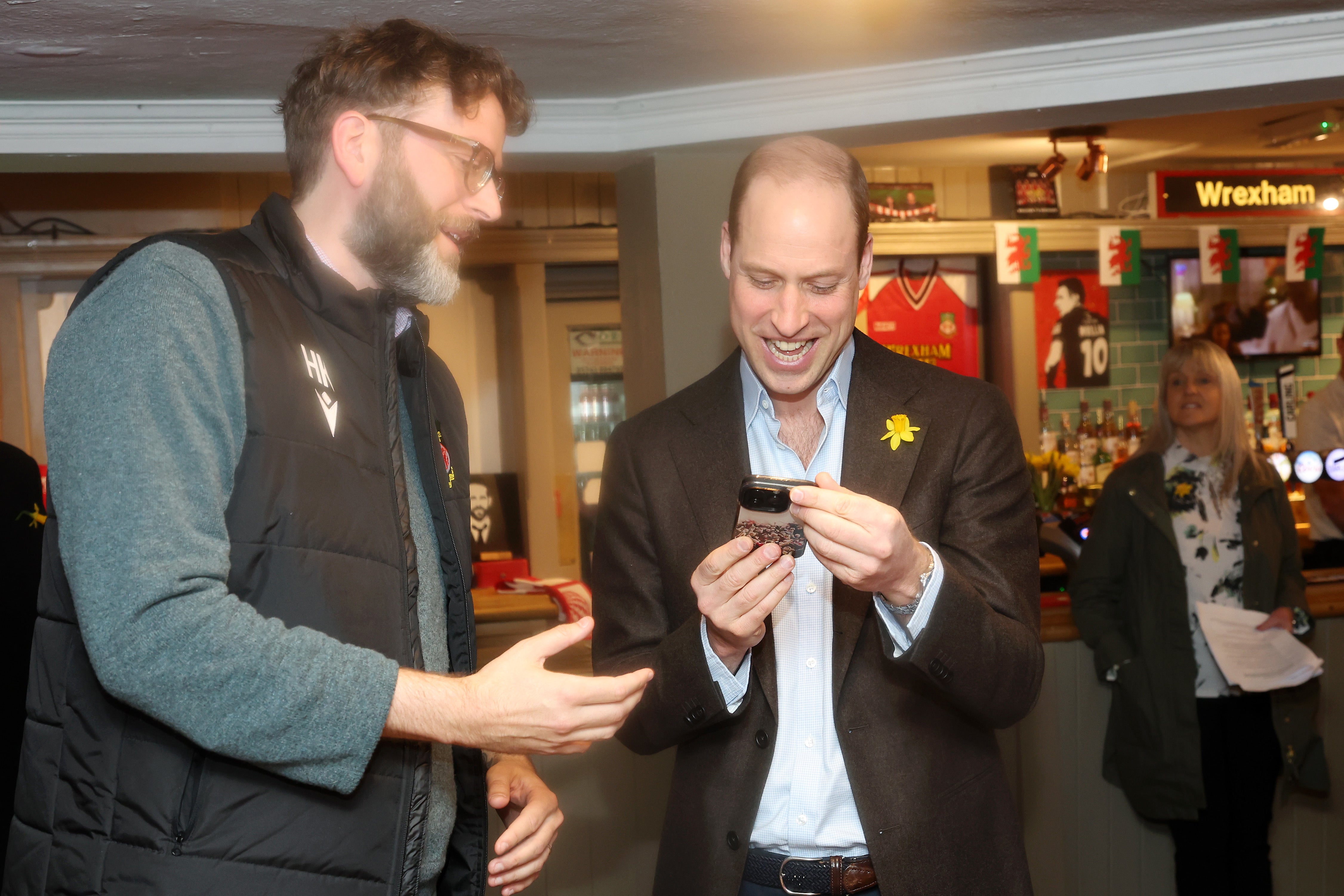 Prince William meets Humphrey Ker during a visit to The Turf public house at Wrexham