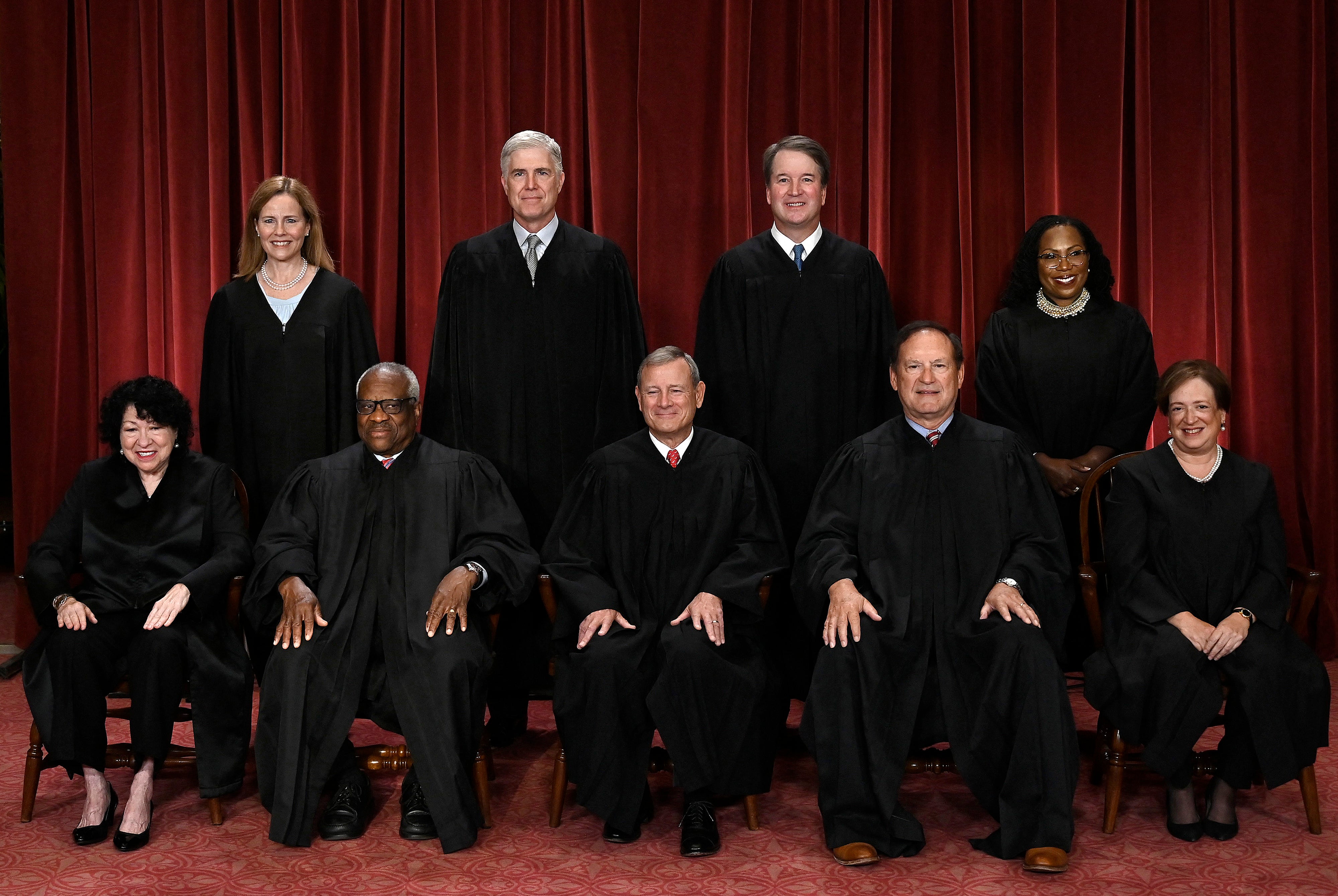 Justices of the US Supreme Court pose for their official photo at the Supreme Court in Washington, DC on October 7, 2022. (Seated from left) Associate Justice Sonia Sotomayor, Associate Justice Clarence Thomas, Chief Justice John Roberts, Associate Justice Samuel Alito and Associate Justice Elena Kagan, (Standing behind from left) Associate Justice Amy Coney Barrett, Associate Justice Neil Gorsuch, Associate Justice Brett Kavanaugh and Associate Justice Ketanji Brown Jackson