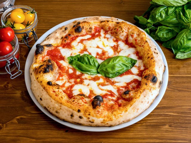<p>According to a new book, tomato sauce on pizza was invented in America in the 19th century </p>