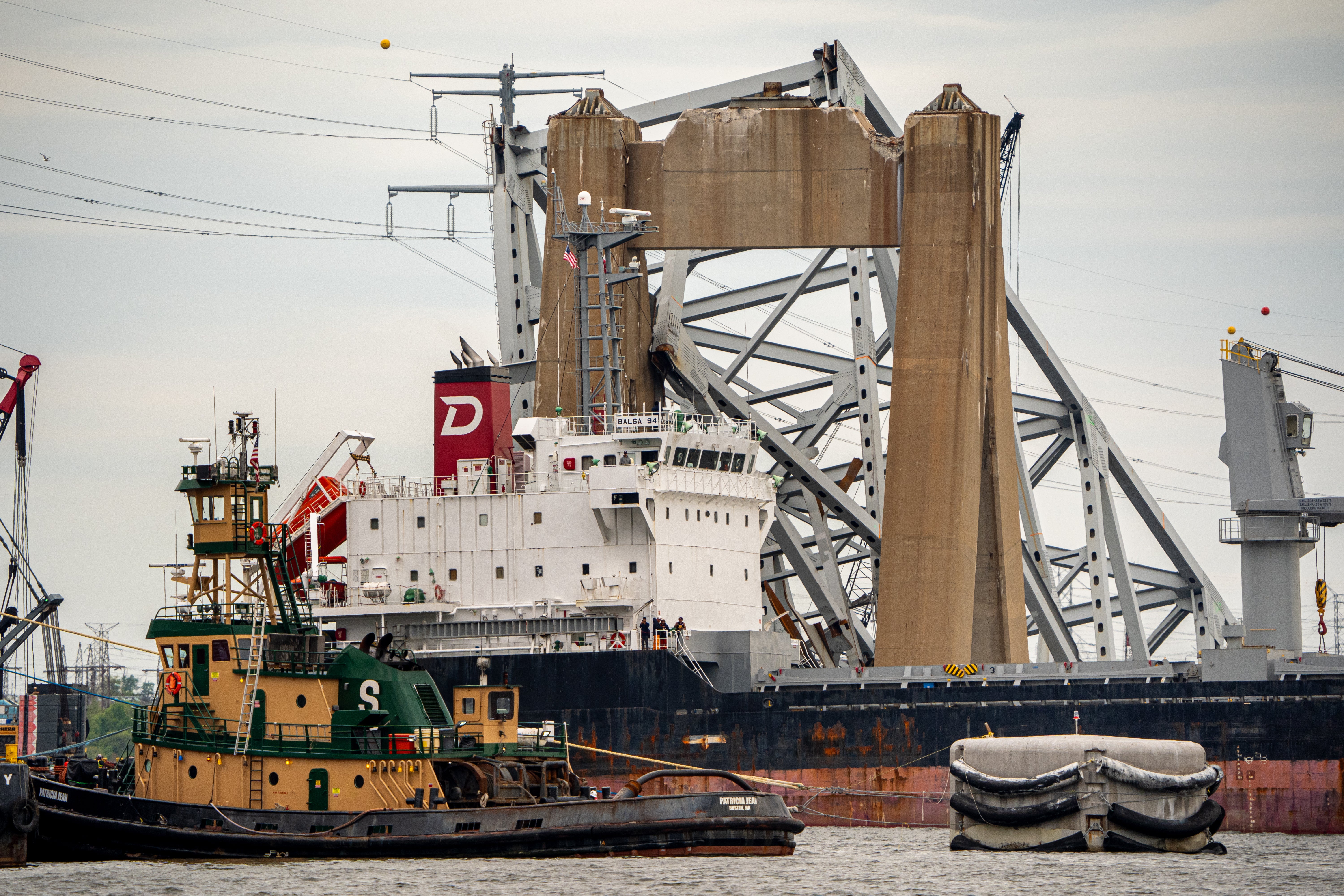 The Balsa 94, a bulk carrier cargo ship, sailing past the Francis Scott Key Bridge wreckage on Thursday