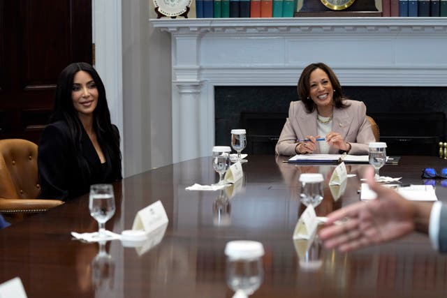 <p>Vice President Kamala Harris and Kim Kardashian listen during a discussion in the Roosevelt Room of the White House in Washington on 25 April 2024</p>