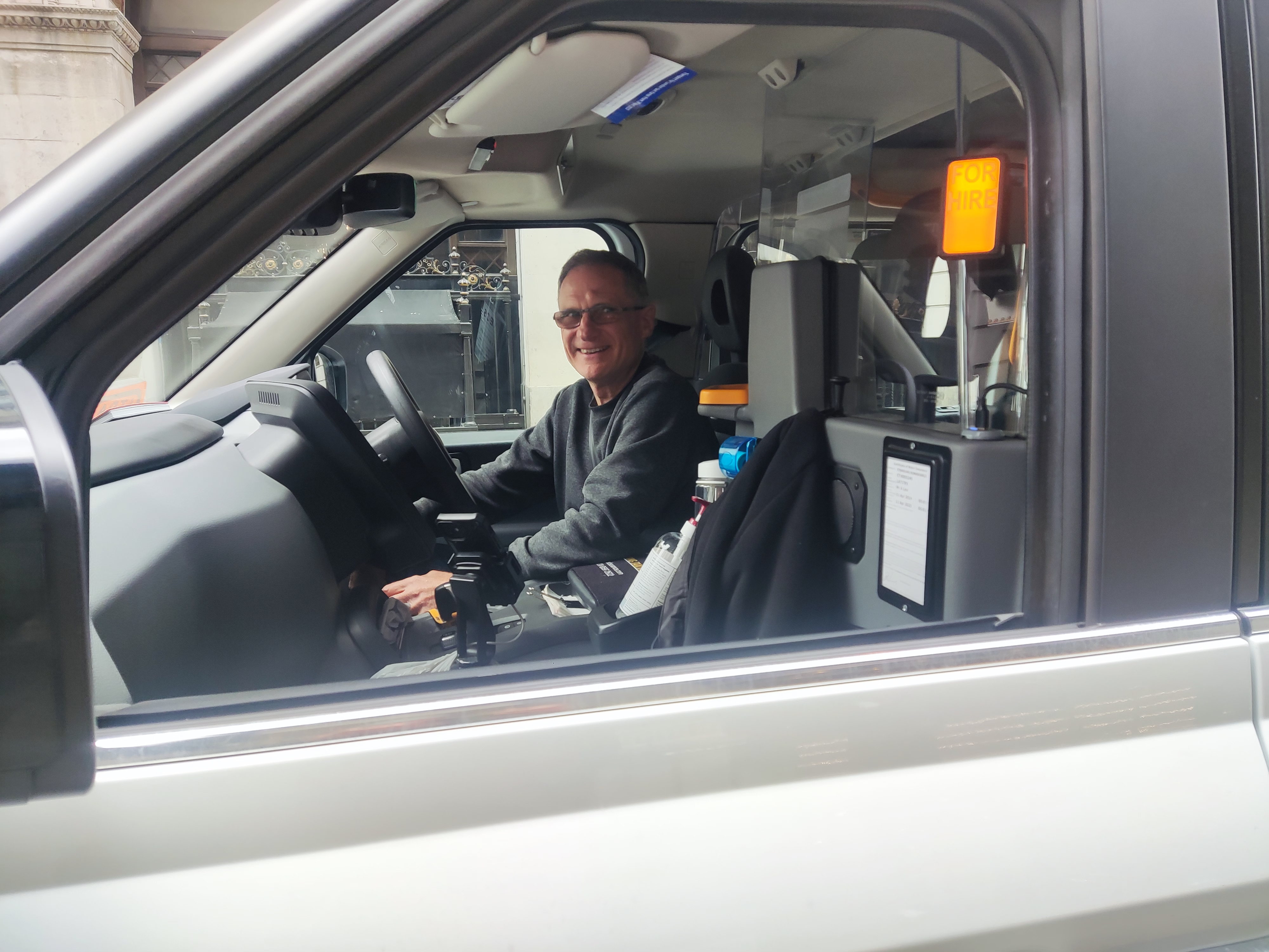 Taxi driver Sam Jewell, who suggested Mr Khan is ‘always passing the buck’, in his cab outside The Ritz